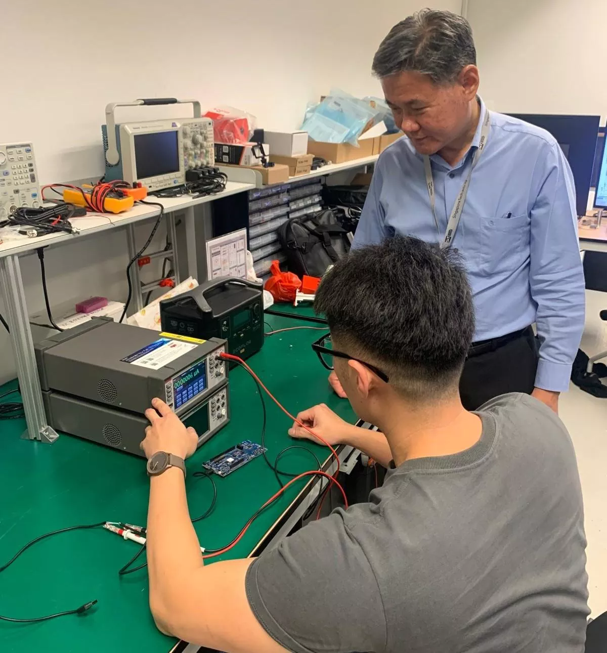 IoT Engineers Testing BLE Device Prototype